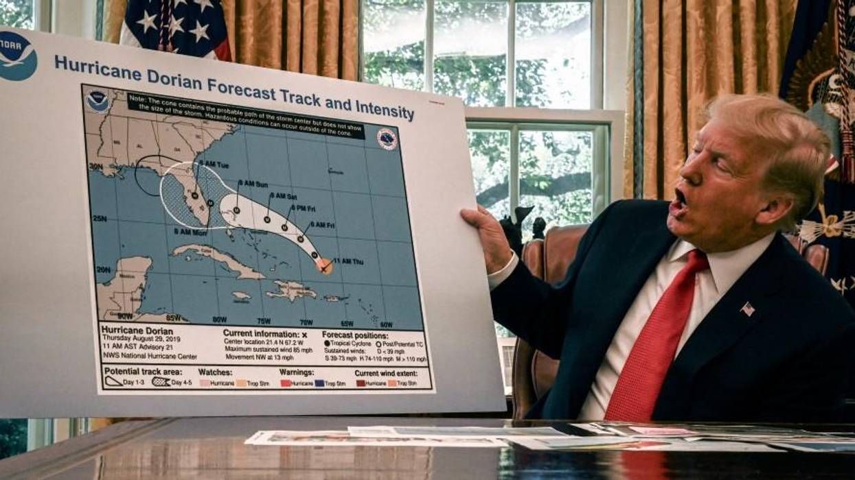Donald Trump with altered Dorian map.