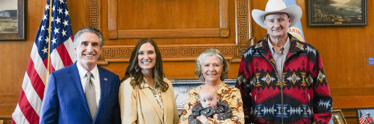 Doug Burgum, Kristi Noem, Karen Budd-Falen, and Frank Falen pose for a photo