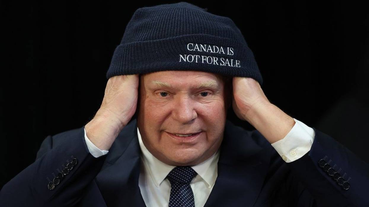 Doug Ford dons a beanie reading "Canada Is Not for Sale"