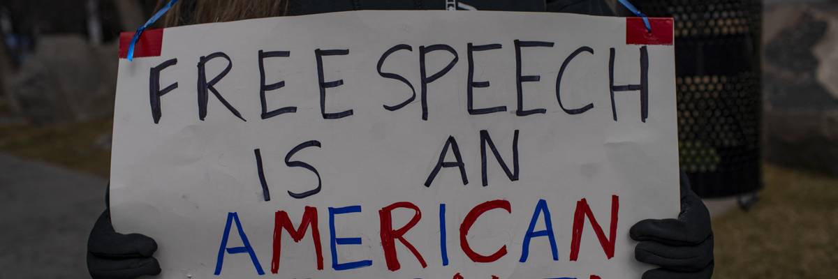 Dozens of people gather in front of the US courthouse building to protest the arrest of Mahmoud Khalil
