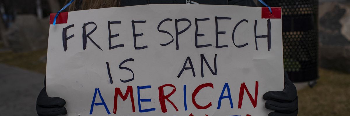 Dozens of people gather in front of the US courthouse building to protest the arrest of Mahmoud Khalil