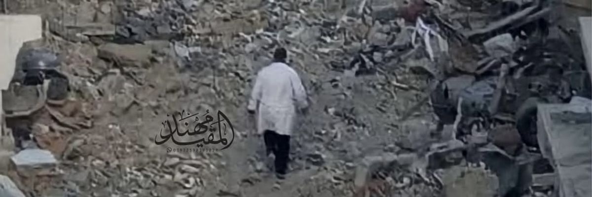 Dr. Husam Abu Safiya in rubble.