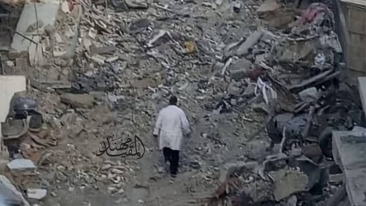 Dr. Husam Abu Safiya in rubble.