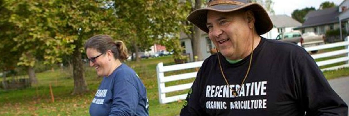 Dr. Kristine Nichols and Mark 'Coach' Smallwood, of the Rodale Institute, are walking with a message and carrying a solution.