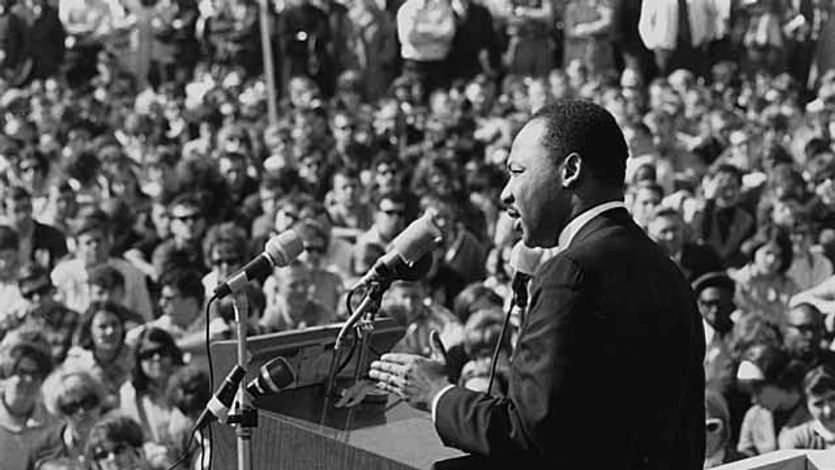 Dr. Martin Luther King speaks to an anti-war rally.