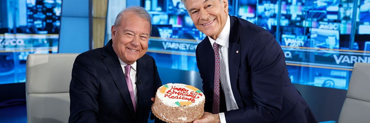 Dr. Mehmet Oz gives Fox Business host Stuart Varney a carrot cake