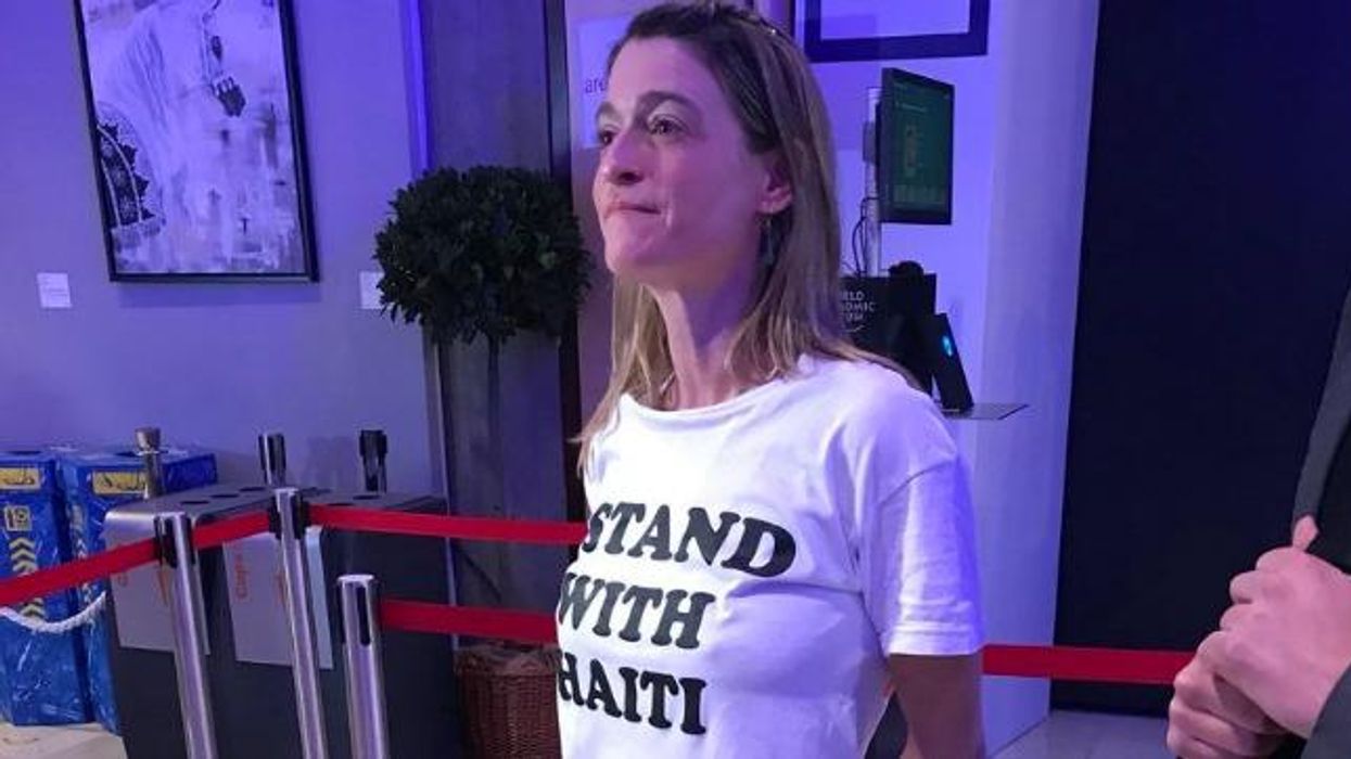 Standing With Haiti, Head of Prominent NGO Walks Out of Trump's Davos Speech