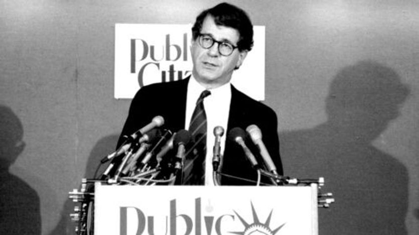 Dr. Sidney M. Wolfe standing at a Public Citizen podium.