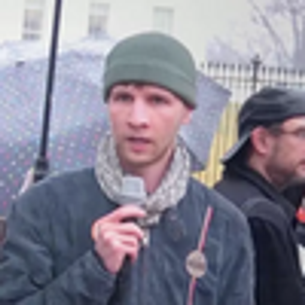 Drone whistleblower Daniel Hale (R) stands next to CodePink co-founder Medea Benjamin outside the White House in Washington, D.C. in this undated photo. (Photo: Democracy Now!)