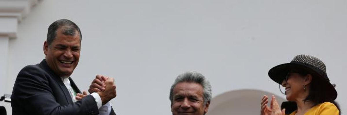 Ecuador's President Rafael Correa (L) greets Presidential candidate Lenin Moreno 
