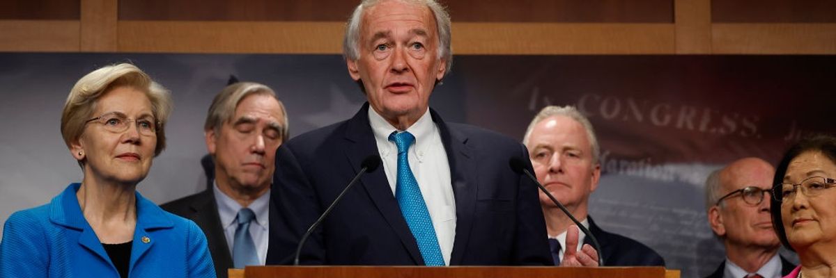 Ed Markey speaks while other Democratic senators look on