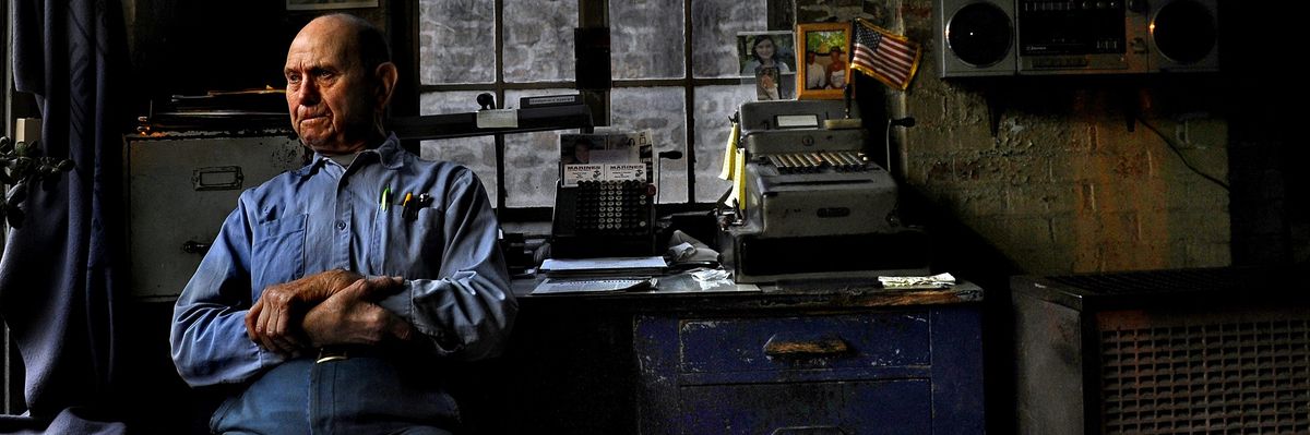 Ed Shepard, waits for customers at his gas station in downtown Welch, a town in McDowell County, West Virginia in 2011.