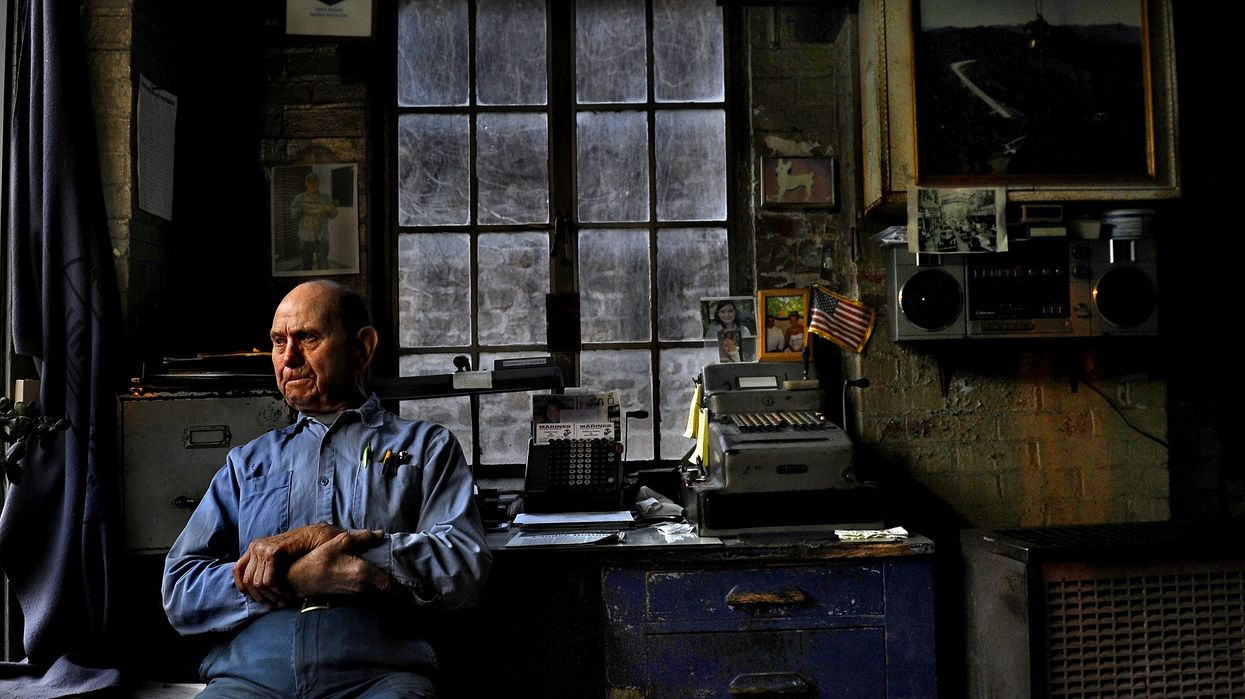 Ed Shepard, waits for customers at his gas station in downtown Welch, a town in McDowell County, West Virginia in 2011.