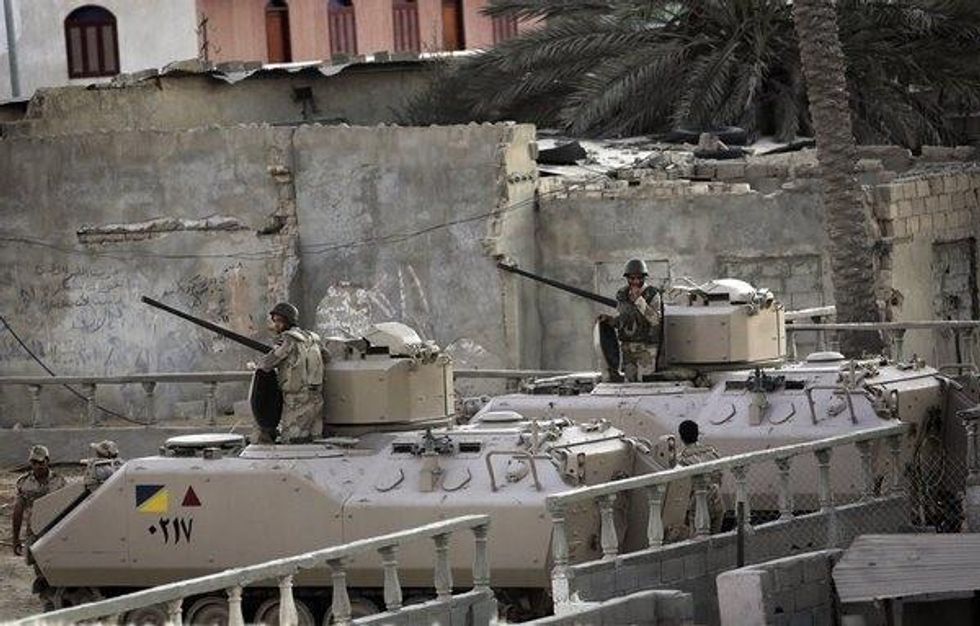 Egyptian forces guard border between Egypt and Gaza. (Photo: Ali Ali / European Pressphoto Agency / September 10, 2013)