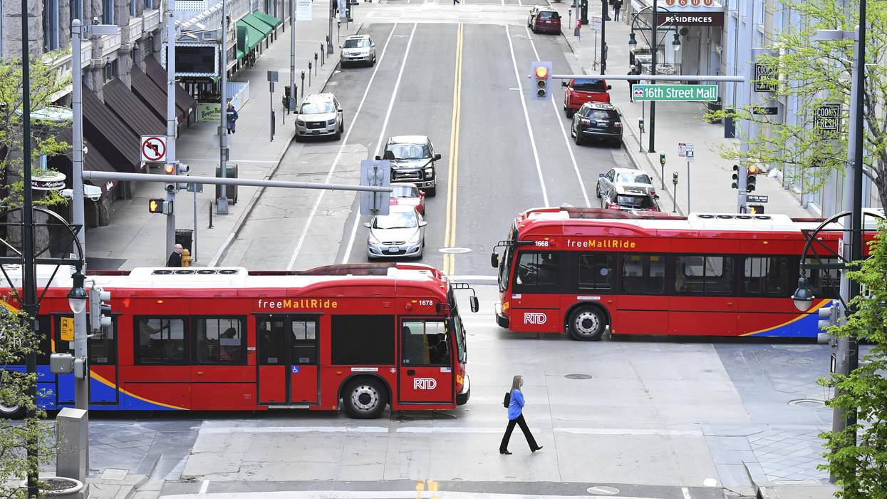 Electric buses are seen on the 16th Street Mall on May 13, 2019 in Denver, Colorado.