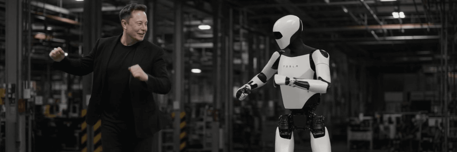 elon-musk-dances-with-a-robot.png?id=68425594&width=1200&height=400&coordinates=0%2C85%2C0%2C359