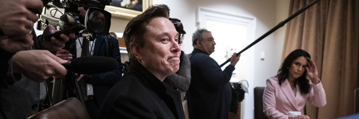Elon Musk listens as President Donald Trump speaks during a Cabinet meeting