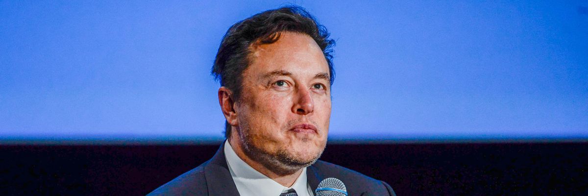 Elon Musk speaks to an audience