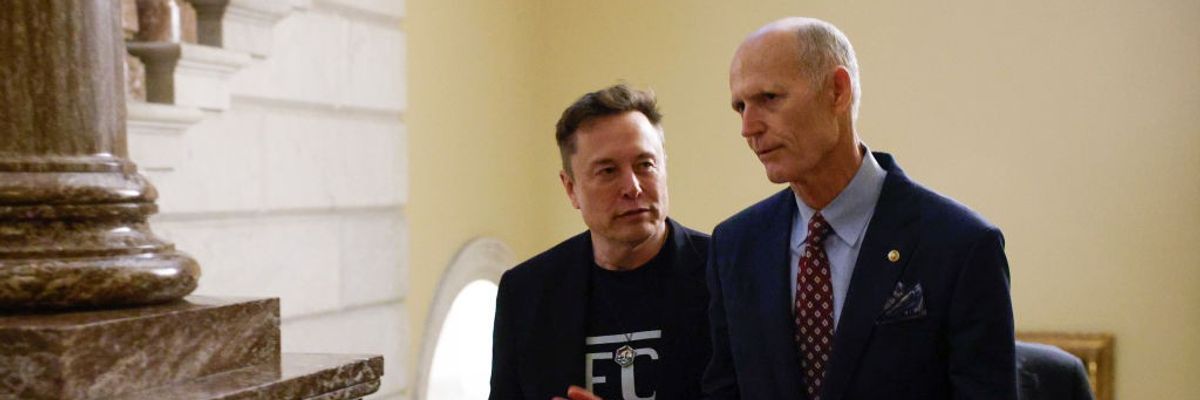Elon Musk walks with Sen. Rick Scott
