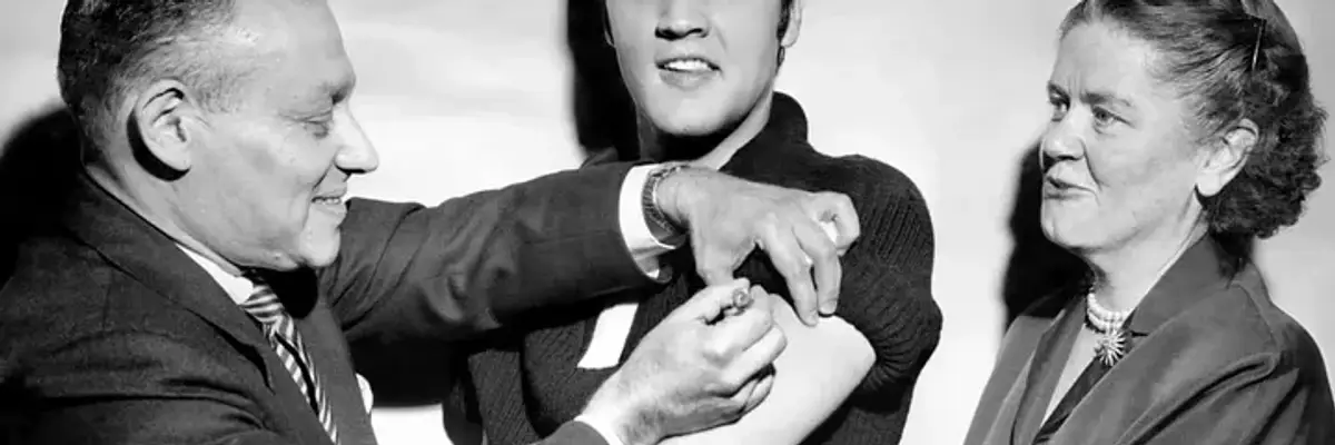 Elvis receiving the polio vaccine.