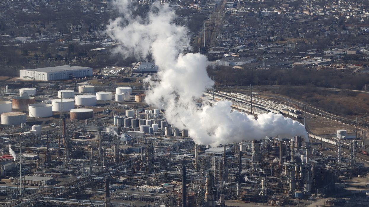 Emissions are seen from a smoke stack at the Phillips 66 Refinery