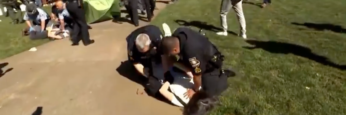 Emory University economics professor Caroline Fohlin was pushed to the ground and subdued by police officers