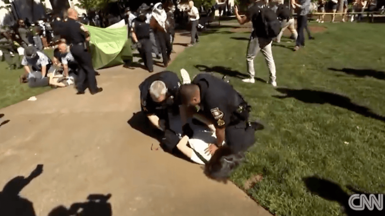 Emory University economics professor Caroline Fohlin was pushed to the ground and subdued by police officers