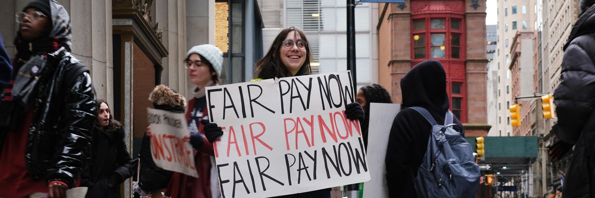 Employees of HarperCollins Publishers participate in a strike