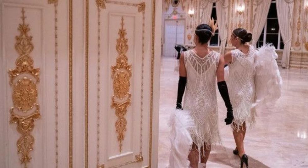 Entertainers dressed as flappers at The Great Gatsby party