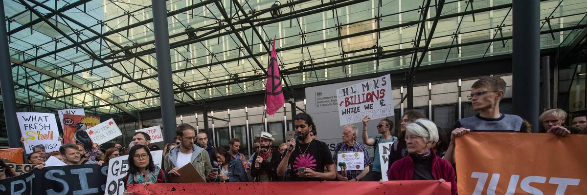 Environmental activists demonstrate against the proposed Jackdaw gas field on June 2, 2022 in London.