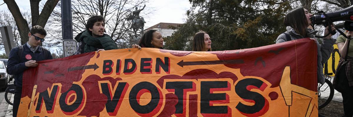 Environmental activists protest against the Willow oil project in Alaska's North Slope region as U.S. President Joe Biden attends a conservation summit at the Interior Department in Washington, D.C. on March 21, 2023.