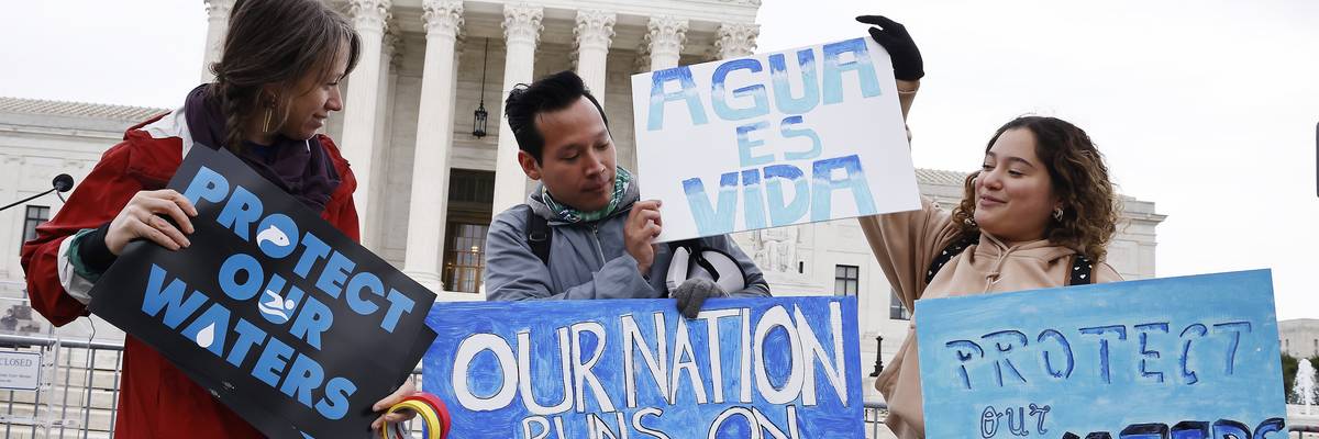 Environmental advocates rally to protect waterways nationwide as the U.S. Supreme Court reviews a related case in Washington, D.C. on October 3, 2022. 