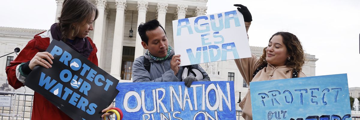 Environmental advocates rally to protect waterways nationwide as the U.S. Supreme Court reviews a related case in Washington, D.C. on October 3, 2022. 