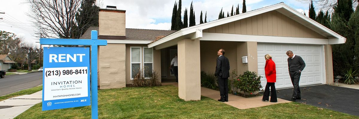 Executives of Invitation Homes, a subsidiary of the hedge fund Blackstone, tour a home