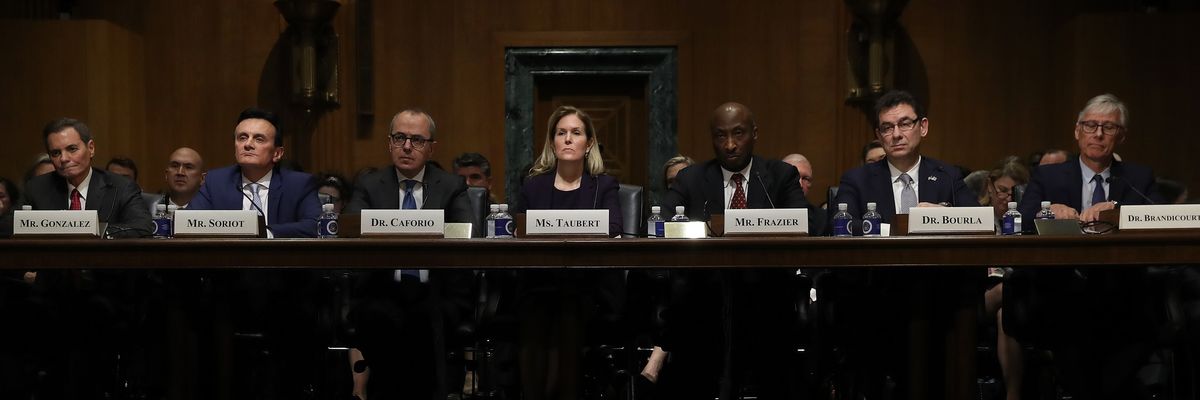 Executives of top pharmaceutical companies testify during a U.S. Senate hearing