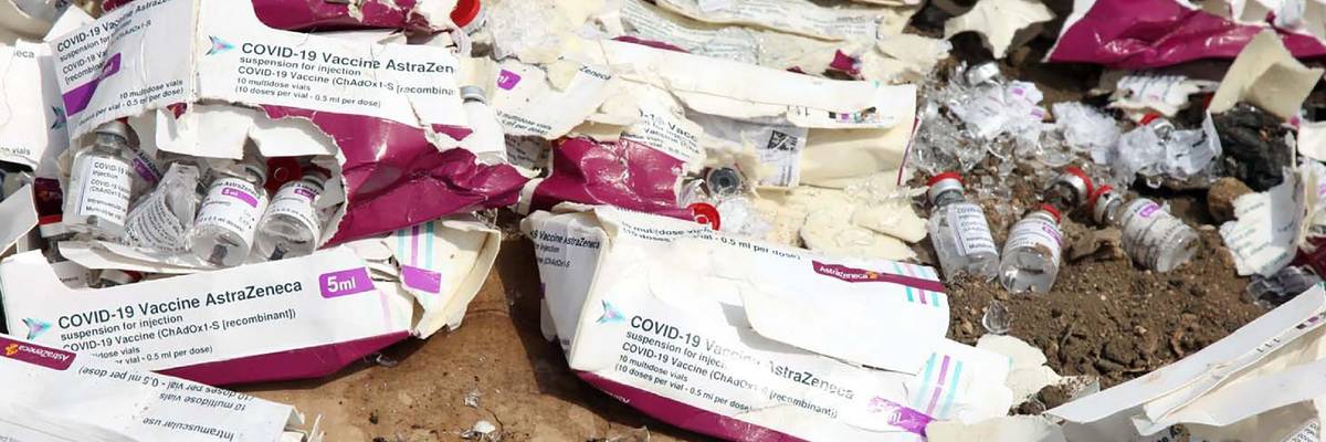 Expired vaccines pictured at a dumpsite