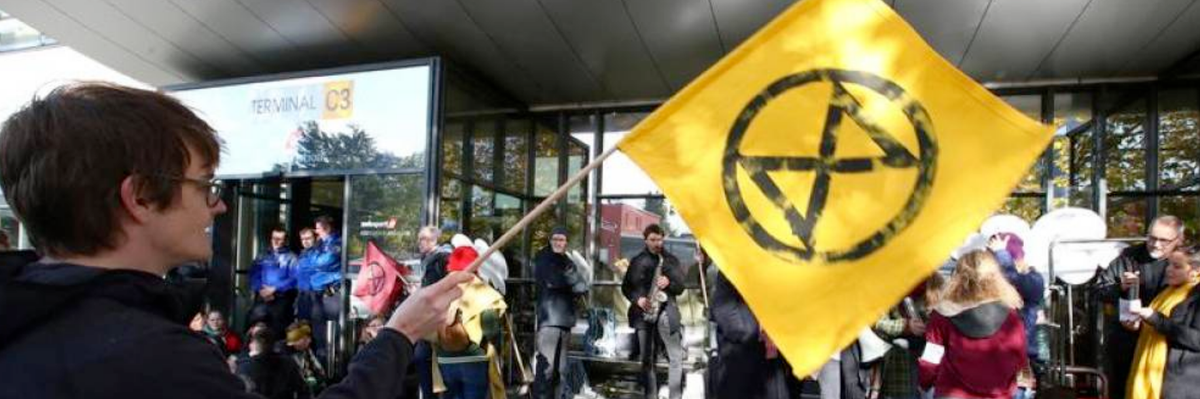 Extinction Rebellion climate change activists block an entrance to general aviation terminal at the Geneva Airport, Switzerland November 16, 2019