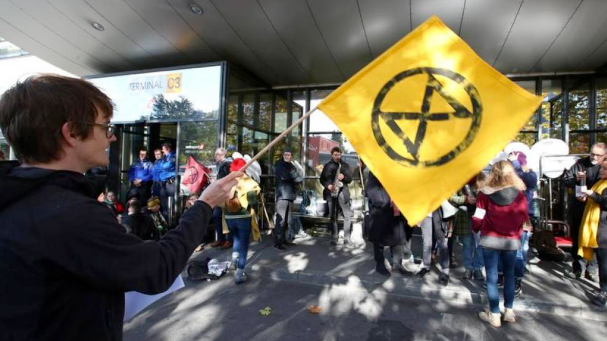 Extinction Rebellion climate change activists block an entrance to general aviation terminal at the Geneva Airport, Switzerland November 16, 2019
