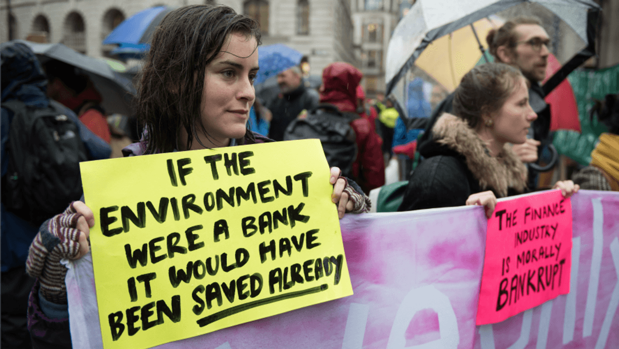 Extinction Rebellion protesters block the roads outside the Bank of England on October 14, 2019 in London.