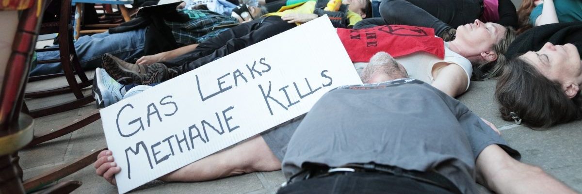 Extinction Rebellion protesters hold a Washington, D.C. die-in
