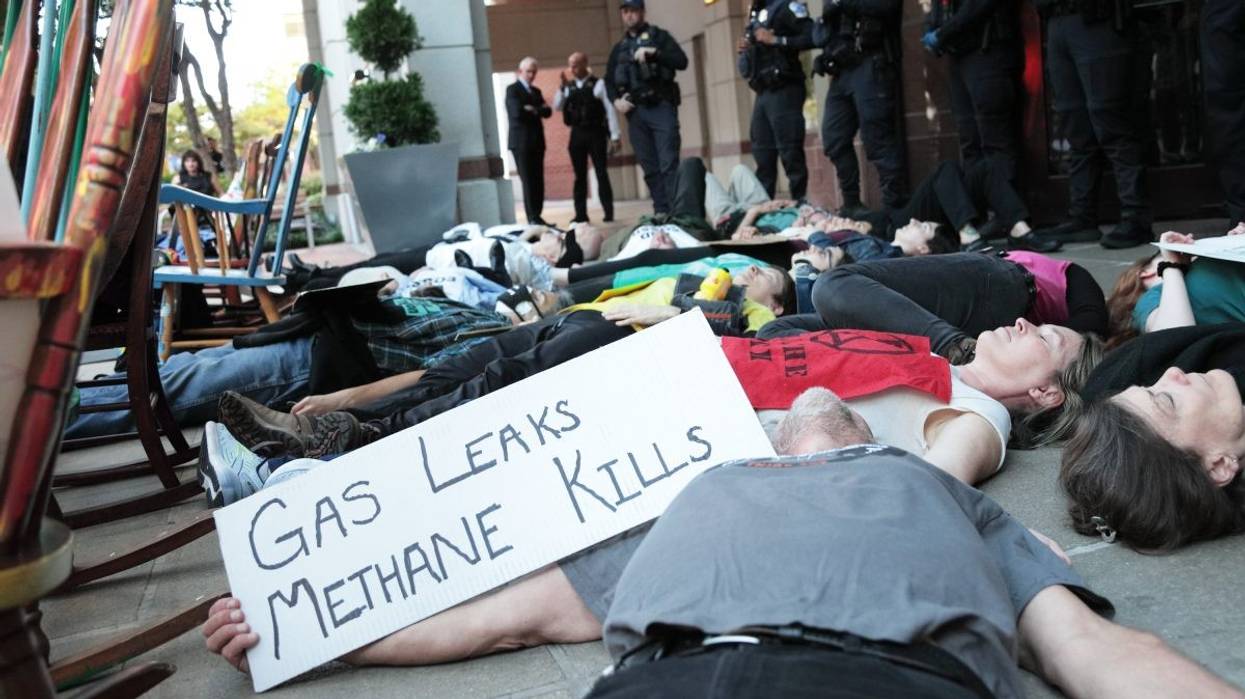 Extinction Rebellion protesters hold a Washington, D.C. die-in