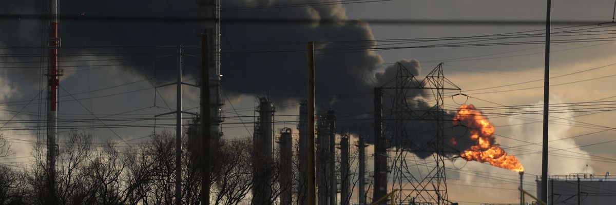 Exxon plant emitting smoke. 