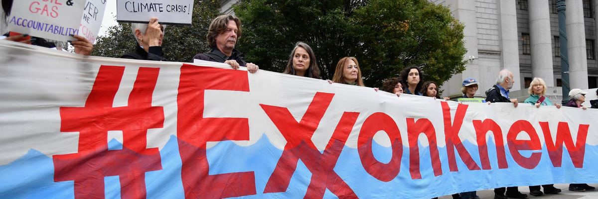 #ExxonKnew sign in NYC in 2019