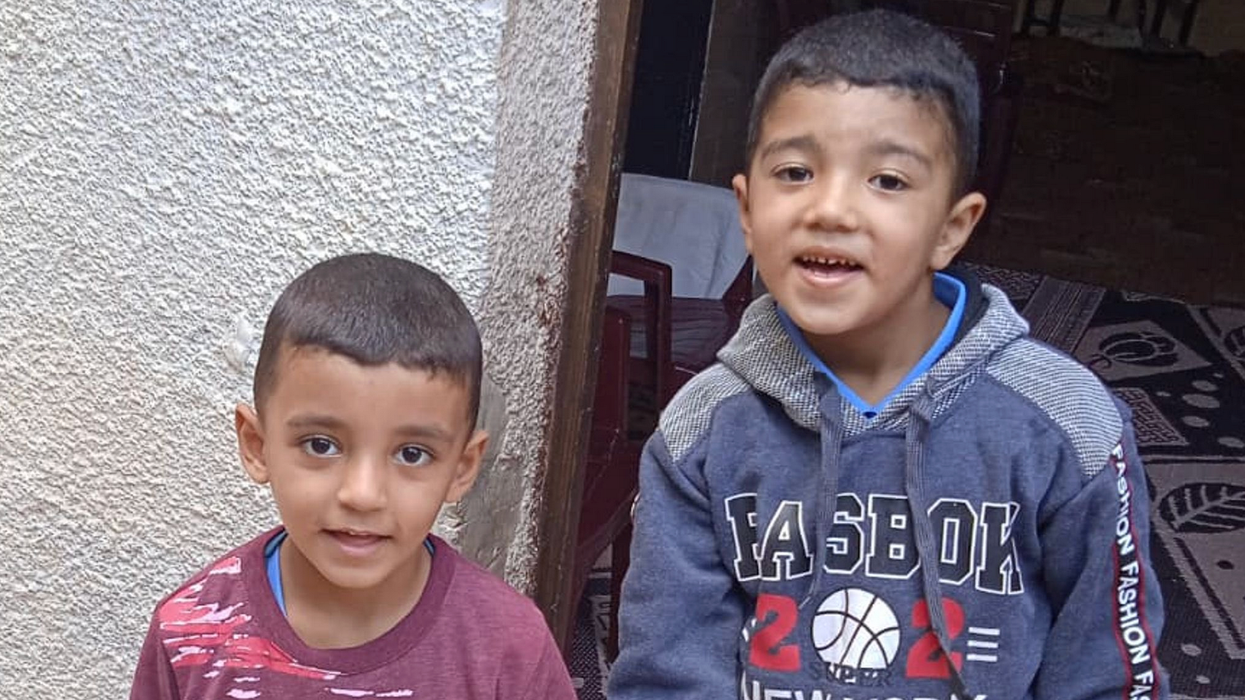 Fadi, 11, and Goma Abu Assi, 8