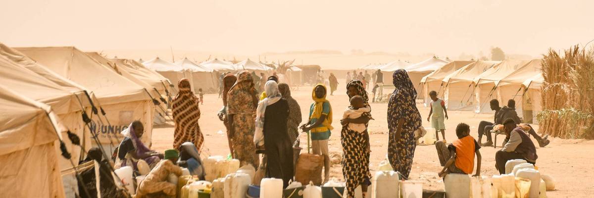 Families gather at a refugee camp in Al-Dabbah, Sudan