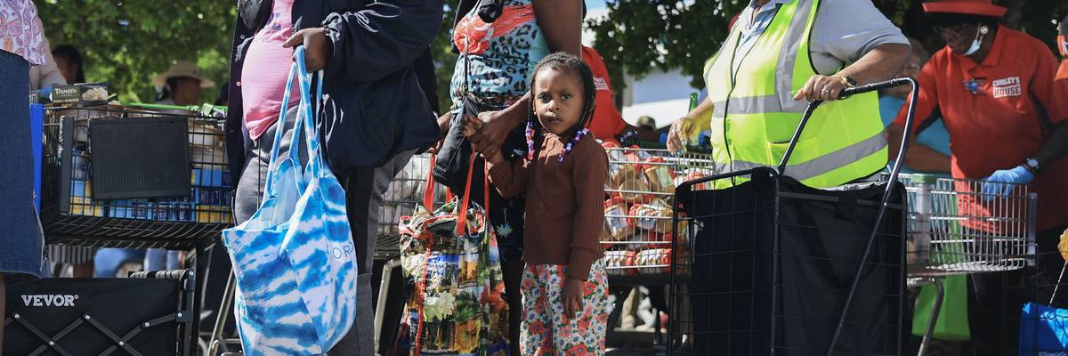 Families receive groceries from a food bank
