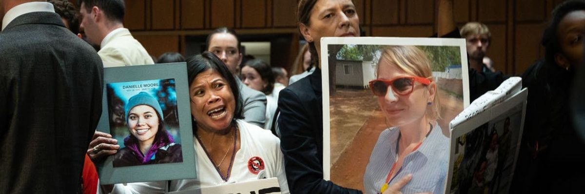 Family members of crash victims demonstrate as Boeing CEO Dave Calhoun testifies