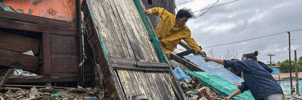 Family salvages belongings amid Hurricane Melissa
