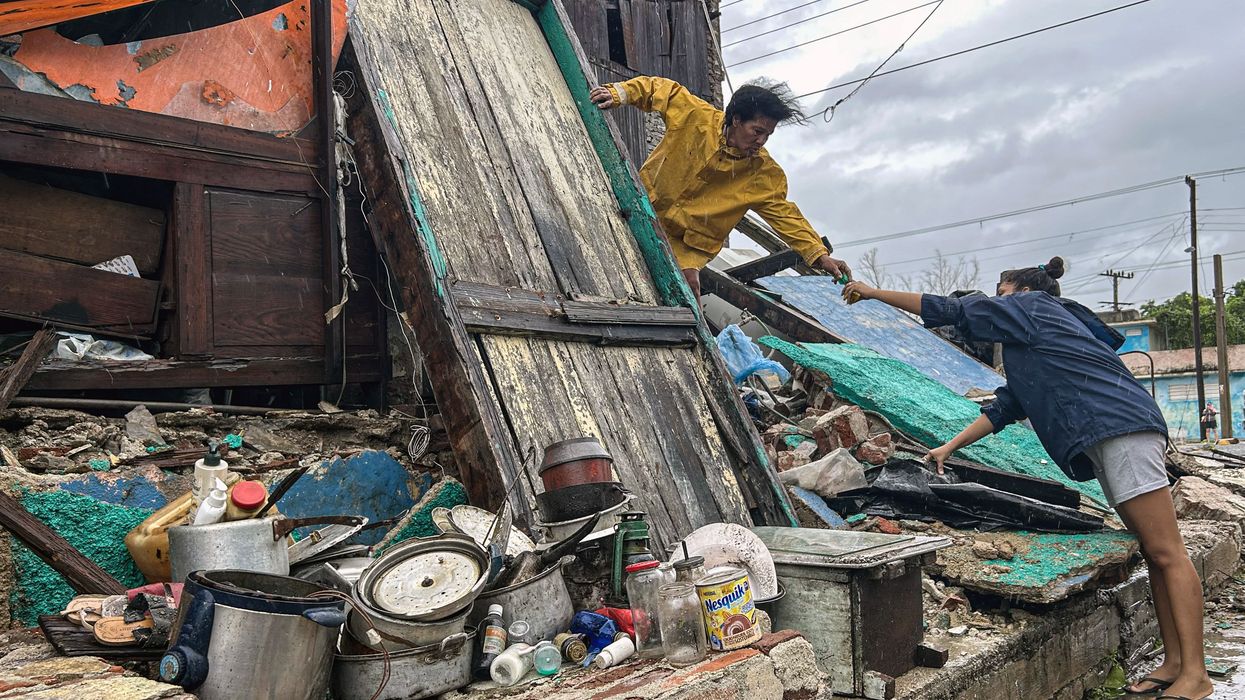 Family salvages belongings amid Hurricane Melissa
