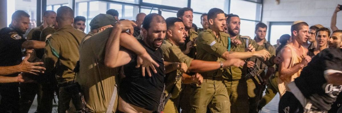 Far-right Israelis clash with Israeli soldiers and police at Beit Lid army base